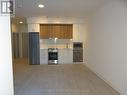 217 - 30 Upper Mall Way, Vaughan, ON  - Indoor Photo Showing Kitchen 