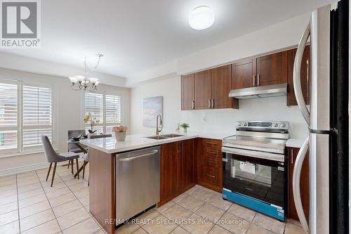 6028 Silken Laumann Way E, Mississauga, ON - Indoor Photo Showing Kitchen With Stainless Steel Kitchen With Double Sink