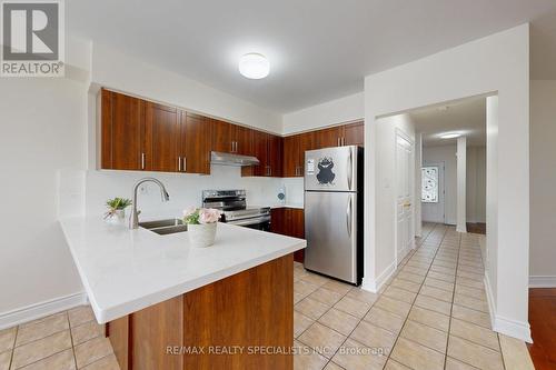 6028 Silken Laumann Way E, Mississauga, ON - Indoor Photo Showing Kitchen With Double Sink