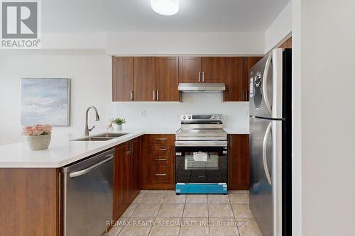 6028 Silken Laumann Way E, Mississauga, ON - Indoor Photo Showing Kitchen With Stainless Steel Kitchen With Double Sink