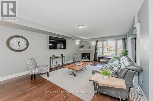 61 Marsh Crescent, Guelph (Pine Ridge), ON - Indoor Photo Showing Living Room With Fireplace