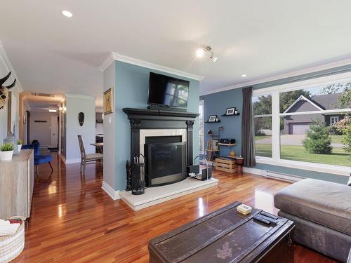 Salon - 416 Rue Des Frênes, Les Cèdres, QC - Indoor Photo Showing Living Room With Fireplace