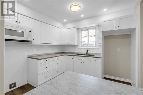 1413 Churchill Street, Cornwall, ON - Indoor Photo Showing Kitchen With Double Sink