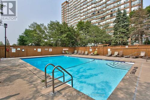 603 - 1270 Maple Crossing Boulevard, Burlington, ON - Outdoor With In Ground Pool With Backyard