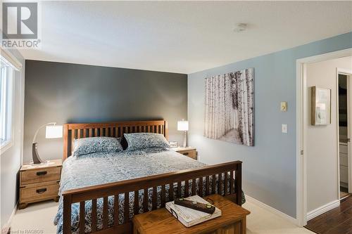 Primary bedroom has double cedar lined closets - 160 Morpeth Street Unit# 19, Southampton, ON - Indoor Photo Showing Bedroom