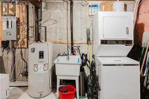 Stacked laundry with sink - 160 Morpeth Street Unit# 19, Southampton, ON - Indoor Photo Showing Laundry Room