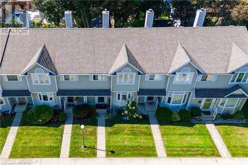 Never cut grass or shovel snow again! - 160 Morpeth Street Unit# 19, Southampton, ON - Outdoor With Facade