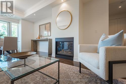 204 - 30 Old Mill Road, Toronto (Kingsway South), ON - Indoor Photo Showing Living Room With Fireplace