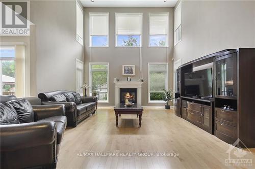 68 Tradewinds Drive, Ottawa, ON - Indoor Photo Showing Living Room With Fireplace