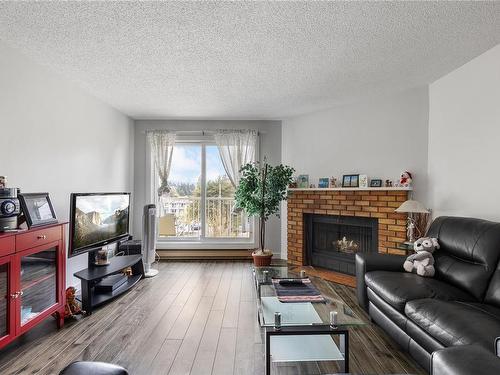 408-3270 Ross Rd, Nanaimo, BC - Indoor Photo Showing Living Room With Fireplace