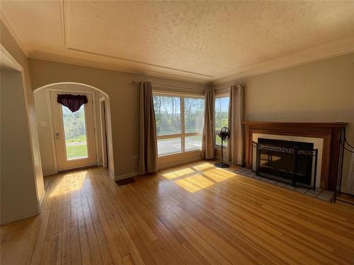 121155 Pth 5 Highway, Mccreary, MB - Indoor With Fireplace