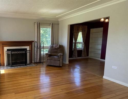 121155 Pth 5 Highway, Mccreary, MB - Indoor Photo Showing Living Room With Fireplace