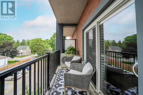 203 - 43 Dale Drive, New Tecumseth (Beeton), ON - Outdoor With Balcony With Exterior