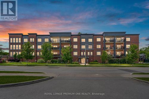 203 - 43 Dale Drive, New Tecumseth, ON - Outdoor With Balcony With Facade