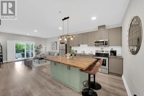 203 - 43 Dale Drive, New Tecumseth (Beeton), ON - Indoor Photo Showing Kitchen With Stainless Steel Kitchen