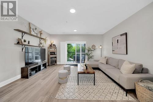 203 - 43 Dale Drive, New Tecumseth (Beeton), ON - Indoor Photo Showing Living Room