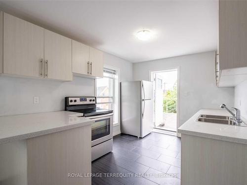 B-1186 Cannon St E, Hamilton, ON - Indoor Photo Showing Kitchen With Double Sink