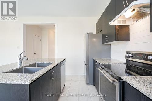 57 Alnwick Street, Barrie (Innis-Shore), ON - Indoor Photo Showing Kitchen With Double Sink With Upgraded Kitchen