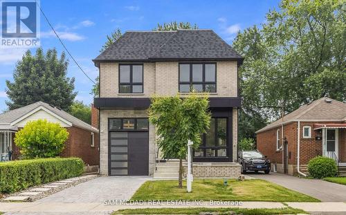 73 Elma Street, Toronto (Mimico), ON - Outdoor With Facade