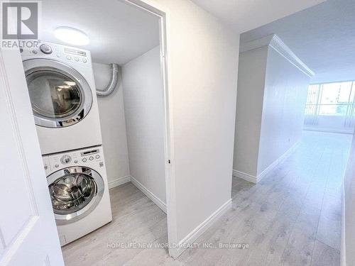 709 - 40 Panorama Court, Toronto (Mount Olive-Silverstone-Jamestown), ON - Indoor Photo Showing Laundry Room