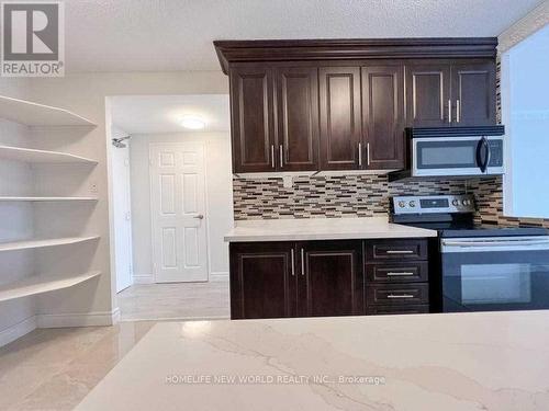 709 - 40 Panorama Court, Toronto (Mount Olive-Silverstone-Jamestown), ON - Indoor Photo Showing Kitchen