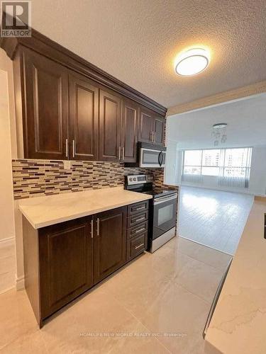 709 - 40 Panorama Court, Toronto (Mount Olive-Silverstone-Jamestown), ON - Indoor Photo Showing Kitchen