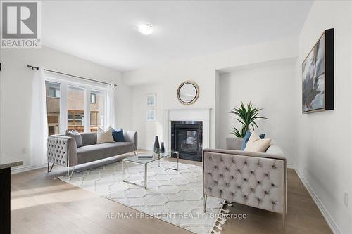 132 Dolobram Trail, Brampton (Northwest Brampton), ON - Indoor Photo Showing Living Room With Fireplace