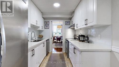 604 - 121 Trudelle Street, Toronto (Eglinton East), ON - Indoor Photo Showing Kitchen With Double Sink With Upgraded Kitchen