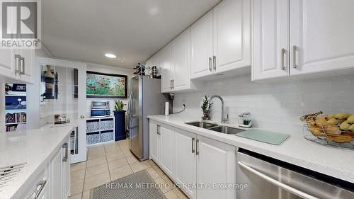 604 - 121 Trudelle Street, Toronto (Eglinton East), ON - Indoor Photo Showing Kitchen With Double Sink With Upgraded Kitchen