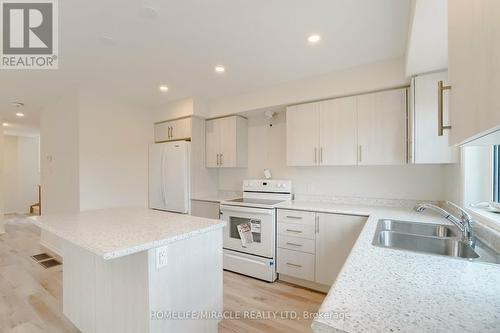 22 Jerome Way, Clarington (Bowmanville), ON - Indoor Photo Showing Kitchen With Double Sink