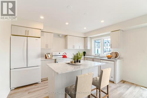 22 Jerome Way, Clarington (Bowmanville), ON - Indoor Photo Showing Kitchen With Double Sink