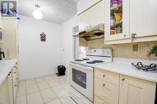 911 - 100 Echo Point, Toronto (L'Amoreaux), ON - Indoor Photo Showing Kitchen