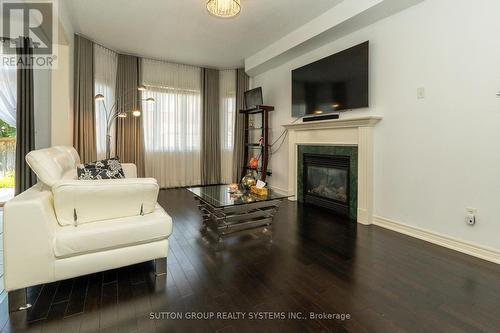 239 Dalgleish Gardens, Milton, ON - Indoor Photo Showing Living Room With Fireplace