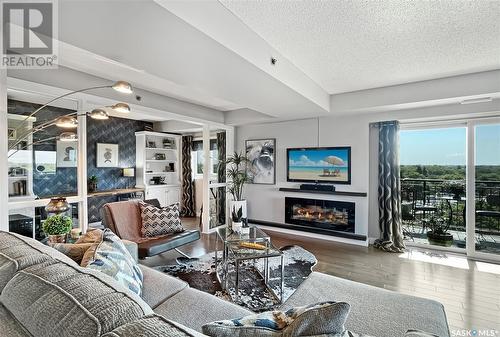 804 611 University Drive, Saskatoon, SK - Indoor Photo Showing Living Room With Fireplace