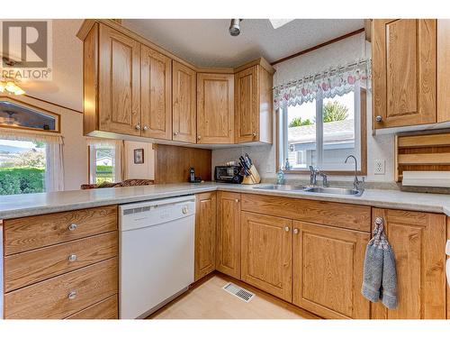 8000 Highland Road Unit# 106, Vernon, BC - Indoor Photo Showing Kitchen With Double Sink