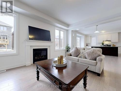 2856 Foxden Square, Pickering, ON - Indoor Photo Showing Living Room With Fireplace