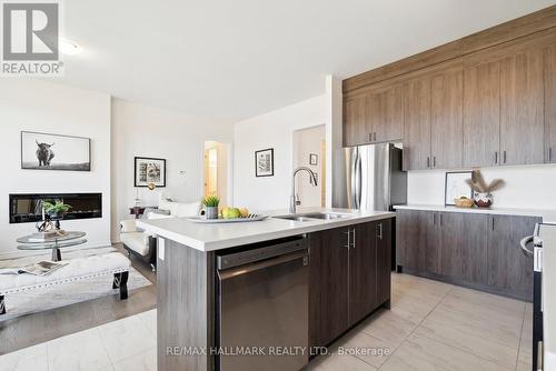 346 Ramblewood Drive, Wasaga Beach, ON - Indoor Photo Showing Kitchen With Fireplace