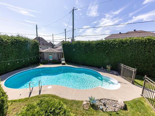 Pool - 45 Rue Du Minervois, Terrebonne (Lachenaie), QC - Outdoor With In Ground Pool With Backyard