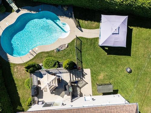 Aerial photo - 45 Rue Du Minervois, Terrebonne (Lachenaie), QC - Outdoor With In Ground Pool