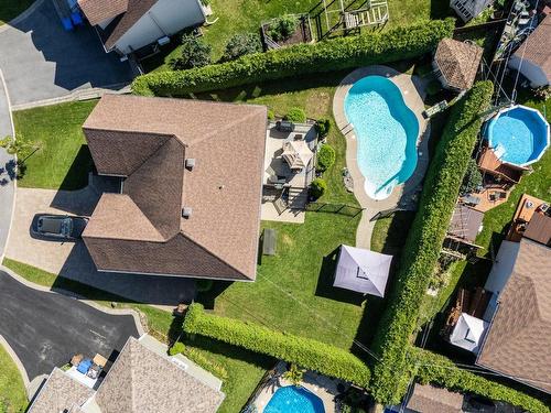 Aerial photo - 45 Rue Du Minervois, Terrebonne (Lachenaie), QC - Outdoor With Above Ground Pool