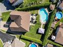 Aerial photo - 45 Rue Du Minervois, Terrebonne (Lachenaie), QC  - Outdoor With Above Ground Pool 