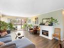 406-1039 Linden Ave, Victoria, BC  - Indoor Photo Showing Living Room With Fireplace 