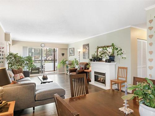 406-1039 Linden Ave, Victoria, BC - Indoor Photo Showing Living Room With Fireplace