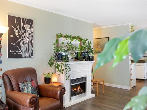 406-1039 Linden Ave, Victoria, BC - Indoor Photo Showing Living Room With Fireplace