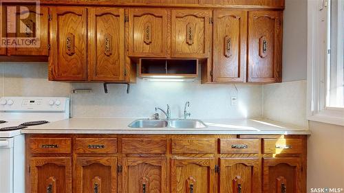 59 Mathieu Crescent, Regina, SK - Indoor Photo Showing Kitchen With Double Sink