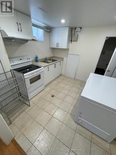 Lower - 9 Willesden Road, Toronto (Hillcrest Village), ON - Indoor Photo Showing Kitchen With Double Sink