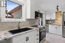 3418 Deerbrook Drive, Windsor, ON  - Indoor Photo Showing Kitchen With Double Sink With Upgraded Kitchen 