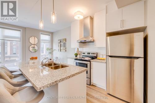 3 - 270 Melvin Avenue, Hamilton (Mcquesten), ON - Indoor Photo Showing Kitchen With Double Sink