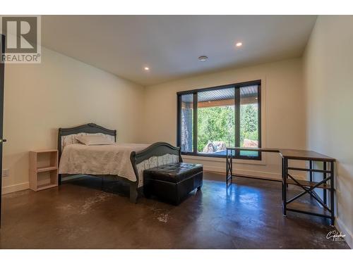 8660 Riverside Drive, Grand Forks, BC - Indoor Photo Showing Bedroom