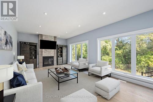 Virtually Staged - 195 Union Avenue, Middlesex Centre (Komoka), ON - Indoor Photo Showing Living Room With Fireplace